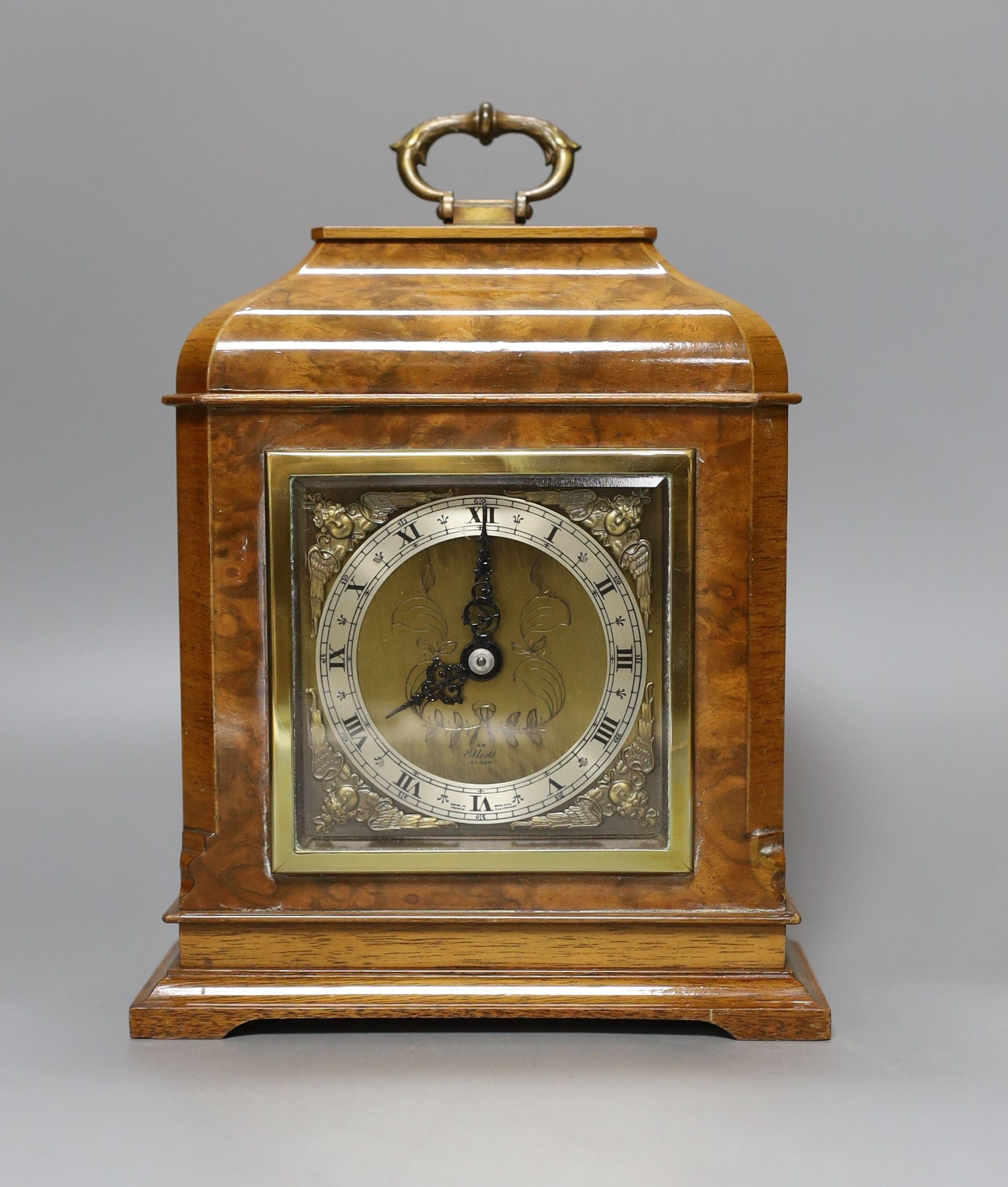 An Elliot mantel clock, walnut case, 22cm